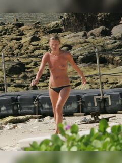 23. Kate Moss's nude flashings + photos topless in a bikini