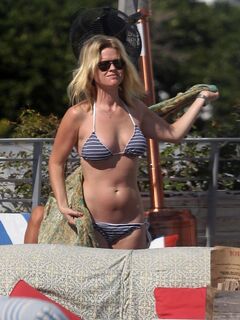 4. Alice Eve's photos in a bikini